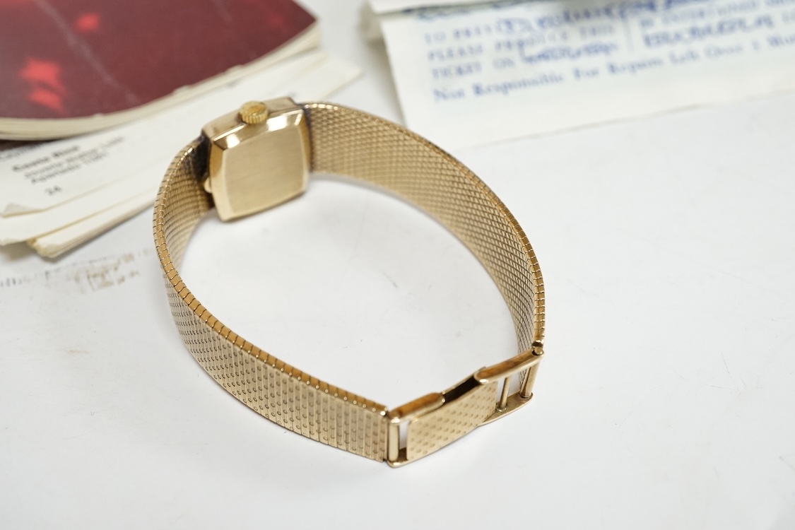 A lady's early 1970's 9ct gold Longines manual wind wrist watch, on an associated 9ct gold bracelet, gross weight 38 grams, with Longines box and pamphlet.